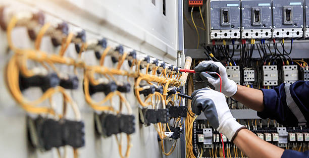 Professional Electrician technician working in Otis Orchards-East Farms, WA